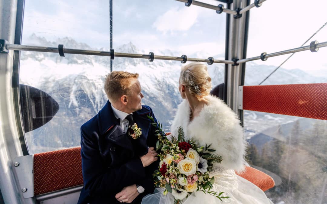 couple in the ski lift to altitude